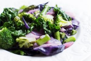 Healthy lifestyle eating vegetables including kale in meals