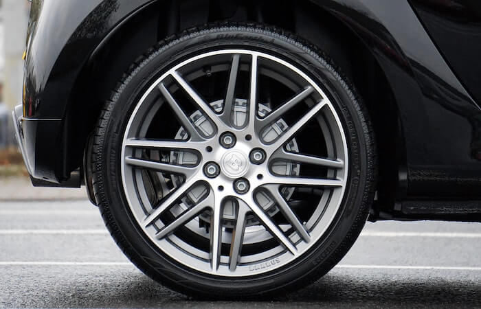 Close-up Photograph of Chrome Vehicle Wheel - when should I replace my tires