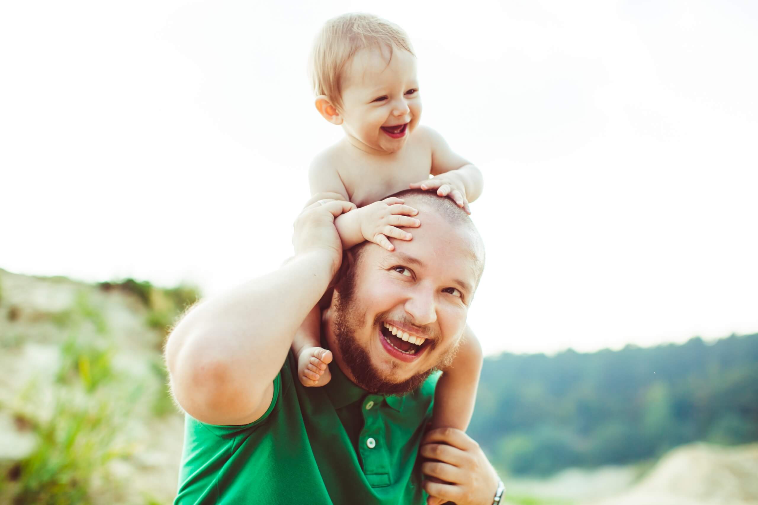 dad playing with child