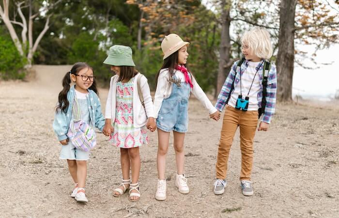 Group of Children Holding Each Others Hands